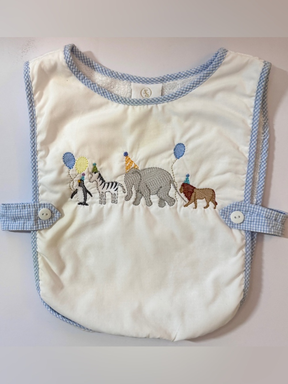 White Baby Bib with Blue Gingham Trim and Embroidered Safari Parade